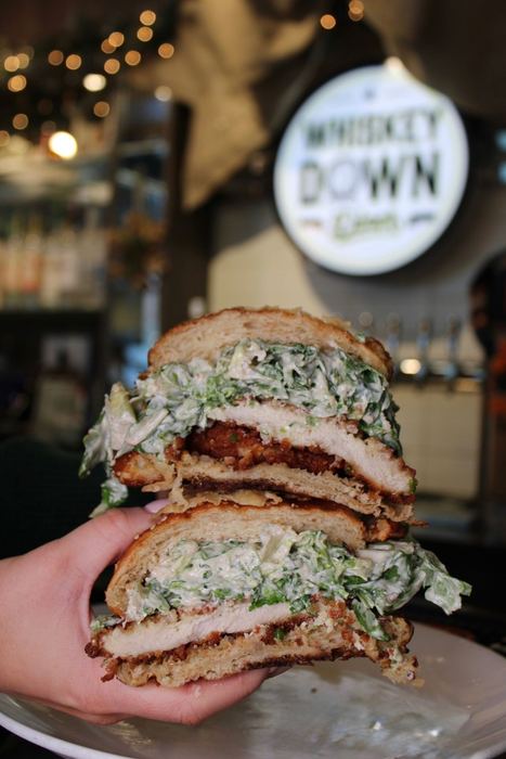 The chicken Caesar sando, cut in half