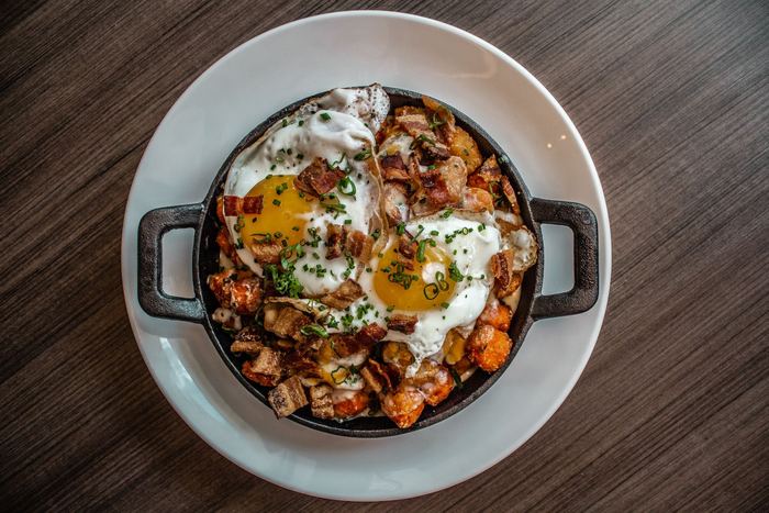 Cast iron egg skillet with peppers and potato