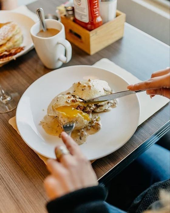 Breakfast at the table with coffee