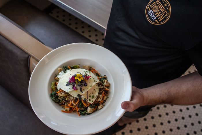 A plate on its way to the table