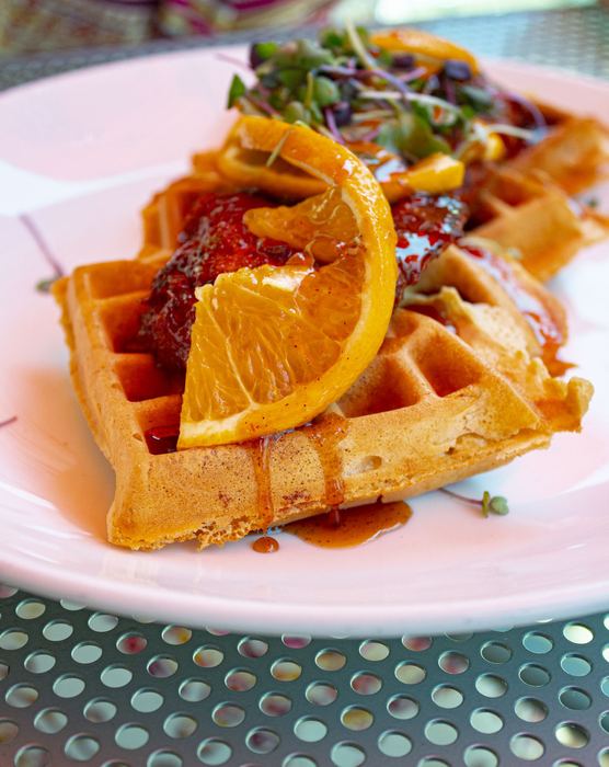 Belgian waffle with citrus and berry compote